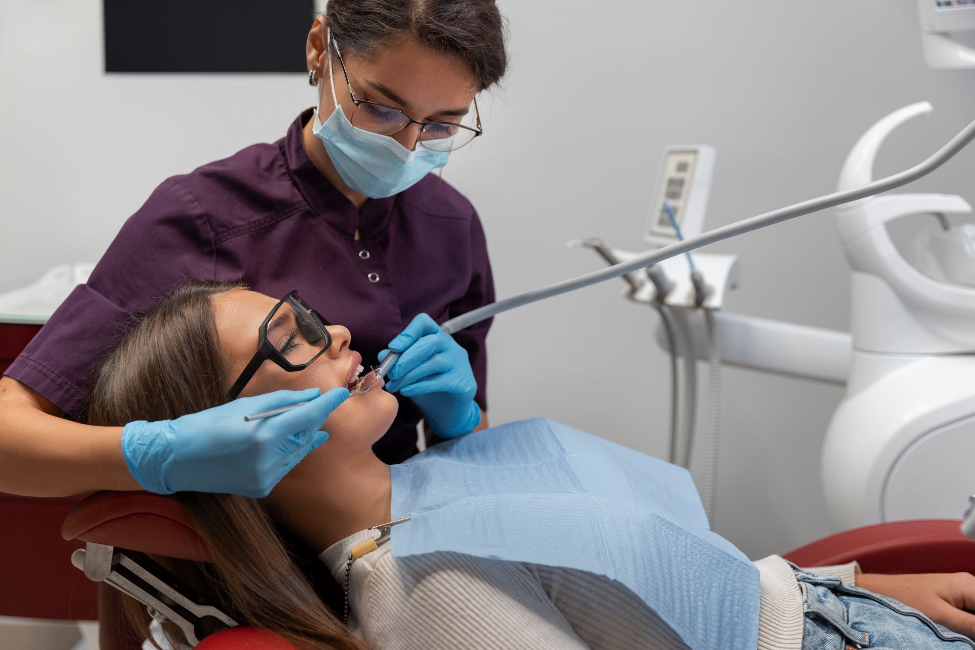 Dentist explaining root canal recovery to a patient at Shoreline Dentistry in Oakville